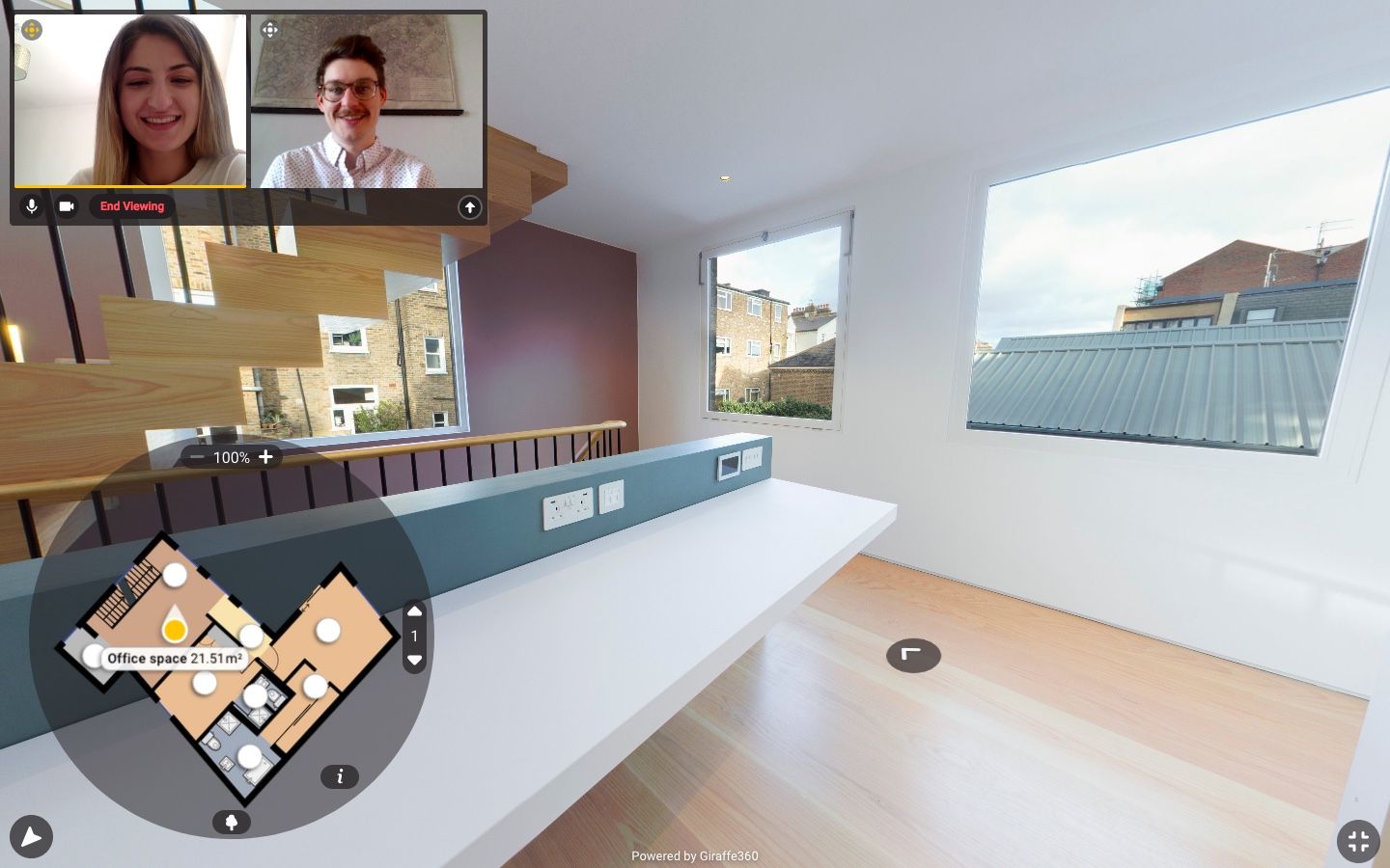 two people viewing a home remotely through a video call